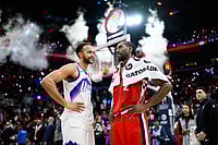 | Photo: AP/William Liang : Utah Jazz forward Kyle Anderson, left, and Los Angeles Clippers forward Kawhi Leonard (2) speak after an NBA basketball game in Inglewood, California. 
