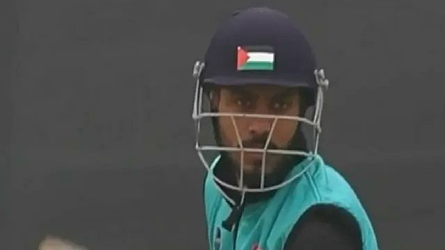  Furqan Ul Haq, a cricketer from south Kashmir was seen wearing a helmet bearing the Palestinian flag  - | X |