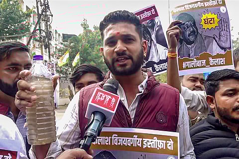 A member of Madhya Pradesh Youth Congress speaks to PTI during a protest over Indore water contamination deaths, in Bhopal.