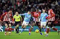 Sunderland 0-0 Man City, Premier League: Citizens Frustrated as Hosts Dig Deep | Photo: Richard Sellers/PA via AP : Manchester City's Phil Foden, center left, and Sunderland's Nordi Mukiele in action during the English Premier League soccer match between Sunderland and Manchester City in Sunderland, England.