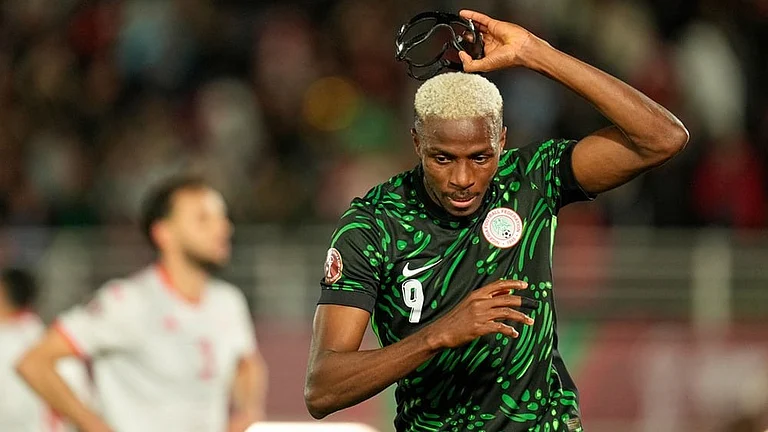 Nigeria's Victor Osimhen reacts after scoring his side's first goal during the Africa Cup of Nations group C soccer match between Nigeria and Tunisia in Fez, Morocco. - | Photo: AP/Mosa'ab Elshamy