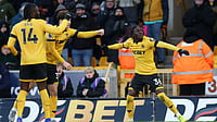Photo: Nigel French/PA via AP : Wolverhampton Wanderers' Mateus Mane celebrates after scoring his side's third goal during the English Premier League match against West Ham United in Wolverhampton.