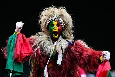 A senegal fan cheers during the Africa Cup of Nations group D soccer match between Senegal and DR Congo in Tangier, Morocco, Saturday, Dec. 27, 2025.