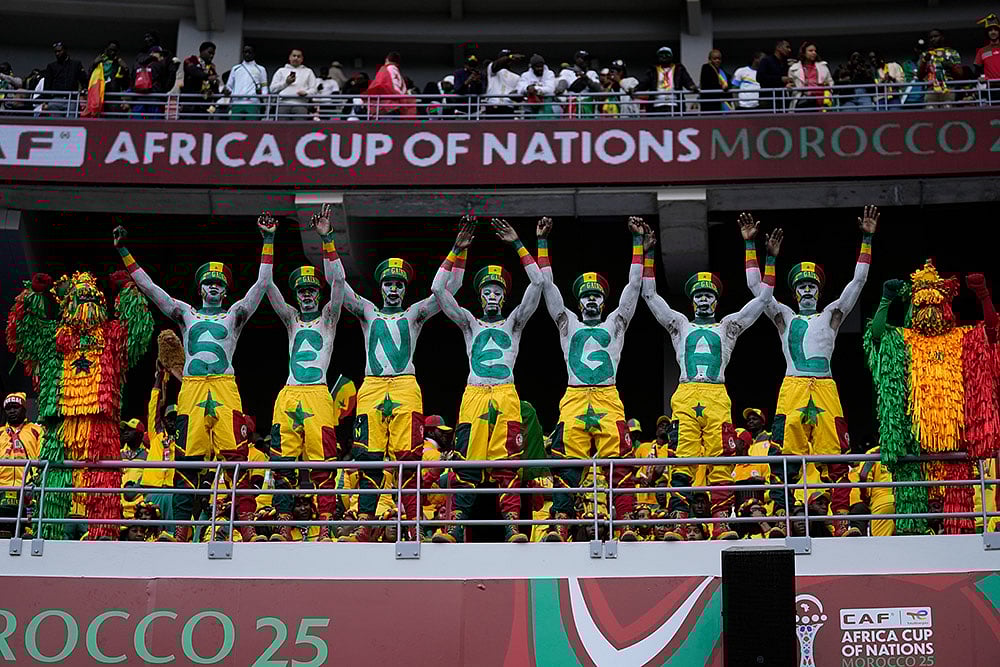 Senegal fans support their national team during the Africa Cup of Nations group D soccer match between Senegal and DR Congo in Tangier, Morocco, Saturday, Dec. 27, 2025.  - | Photo: AP/Themba Hadebe