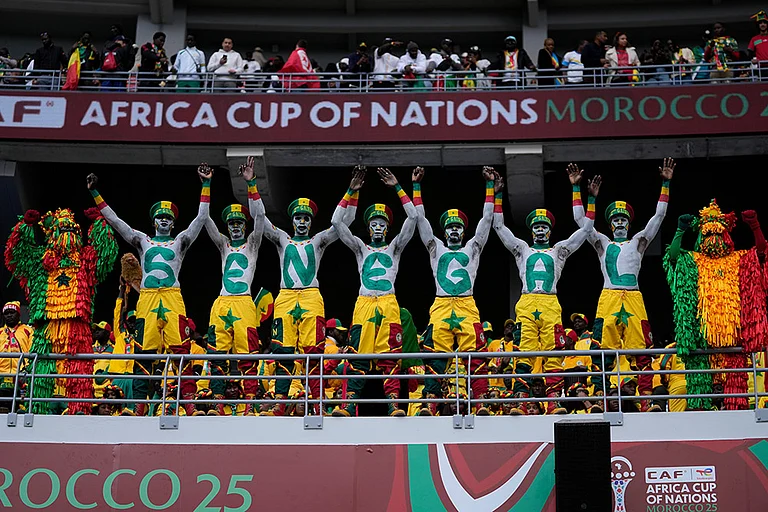 Senegal fans support their national team during the Africa Cup of Nations group D soccer match between Senegal and DR Congo in Tangier, Morocco, Saturday, Dec. 27, 2025. - | Photo: AP/Themba Hadebe