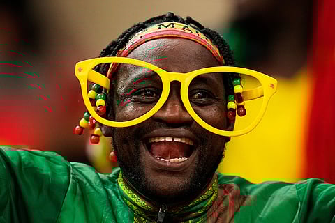 A Mali soccer fan waits for the start of the African Cup of Nations Group A soccer match between Morocco and Mali in Rabat, Friday, Dec. 26, 2025. 