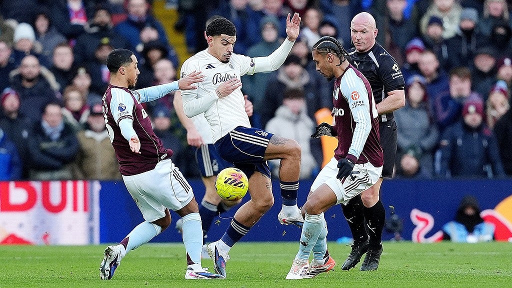 Aston Villa's Youri Tielemans, left, and Boubacar Kamara battle for the ball with Nottingham Forest's Morgan Gibbs-White, centre, during their English Premier League match in Birmingham. - Photo: Cody Froggatt/PA via AP