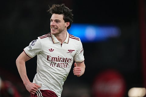 Arsenal's Declan Rice celebrates after scoring his sides second goal during the English Premier League soccer match between Bournemouth and Arsenal in Bournemouth, England.
