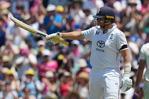 England's Joe Root gestures after scoring 50 runs during play on day one of the fifth and final Ashes cricket test between England and Australia in Sydney.