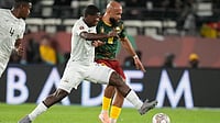 SA 0-2 CMR Highlights, AFCON 2025-26 Round Of 16: Indomitable Lions Progress Despite Bafana Bafana's Late Fightback AP : South Africa's Mbekezeli Mbokazi and Cameroon's Bryan Mbeumo challenge for the ball during the Africa Cup of Nations round of 16 soccer match.