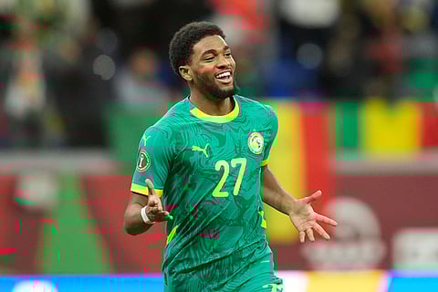 Senegal's Ibrahim Mbaye celebrates after scoring during the Africa Cup of Nations best of 16 soccer match between Senegal and Sudan in Tangier, Morocco.