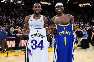 | Photo: AP/Justine Willard : Golden State Warriors forward Jonathan Kuminga (1) and Utah Jazz center Oscar Tshiebwe (34) swap jerseys after the Warriors defeat the Jazz during an NBA basketball game in San Francisco.
