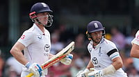 (AP Photo/Mark Baker) : England's Joe Root runs between the wickets with teammate Harry Brook, left, during play on day one of the fifth and final Ashes cricket test between England and Australia in Sydney, Sunday, Jan. 4, 2026. 