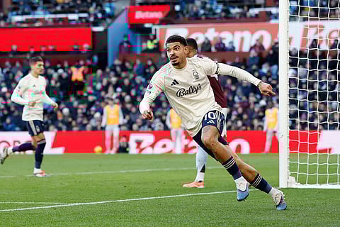Nottingham Forest's Morgan Gibbs-White celebrates after scoring his sides first goal during their English Premier League soccer match against Aston Villa in Birmingham, England.