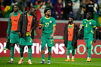 | Photo: AP/Mosa'ab Elshamy : Senegal players walk off the pitch after the Africa Cup of Nations best of 16 soccer match between Senegal and Sudan in Tangier, Morocco.