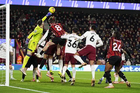 Bournemouth's goalkeeper Dorde Petrovic clears the ball during the English Premier League soccer match between Bournemouth and Arsenal in Bournemouth, England.