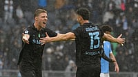 Lazio Vs Napoli Highlights, Serie A 2025-26: Partenopei Win 2-0 As Three Red Cards Spark Late Chaos (Fabrizio Corradetti/LaPresse via AP) : Napoli's Amir Rrahmani, right, celebrates with teammate Rasmus Hojlund after scoring during the Italian Serie A soccer match between SS Lazio and SSC Napoli in Rome, Sunday, Jan. 4, 2026.