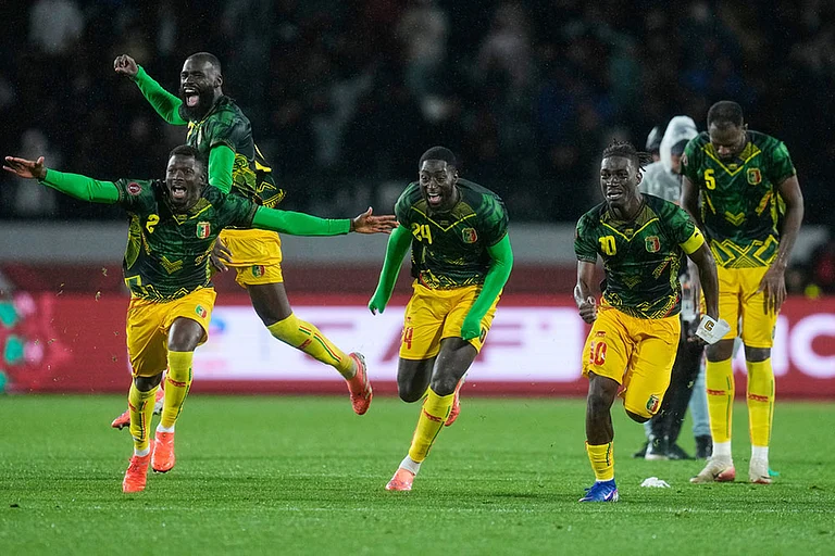 Mali players celebrate after the penalty shootout of the Africa Cup of Nations best of 16 soccer match between Mali and Tunisia in Casablanca, Morocco. - | Photo: AP/Themba Hadebe