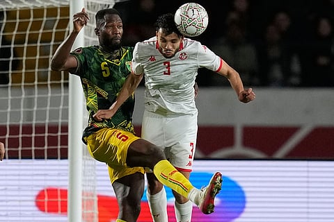 Mali's Abdoulaye Diaby left, and Tunisia's Montassar Talbi fight for the ball during the Africa Cup of Nations best of 16 soccer match between Mali and Tunisia in Casablanca, Morocco.
