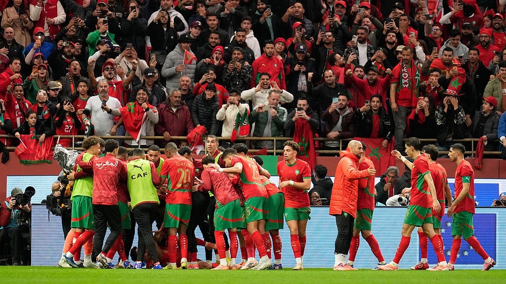 Moroccan players celebrate after teammate Brahim Diaz scored the winning goal during the Africa Cup of Nations round of 16 match against Tanzania in Rabat. - Photo: AP