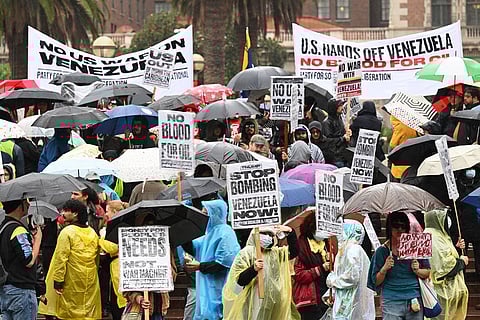 Protesters denounce the U.S. attack on Venezuela at Pershing Square in Los Angeles.