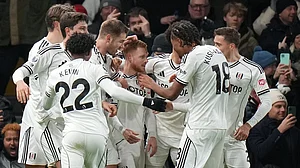 Photo: AP : Fulham's Harrison Reed, centre, celebrates after scoring his side's second goal during the English Premier League match against Liverpool in London.