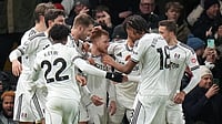 Premier League Matchday 20 Highlights: Reed Stunner Snatches Fulham Draw Against Liverpool; Brentford Best Everton 4-2 Photo: AP : Fulham's Harrison Reed, centre, celebrates after scoring his side's second goal during the English Premier League match against Liverpool in London.