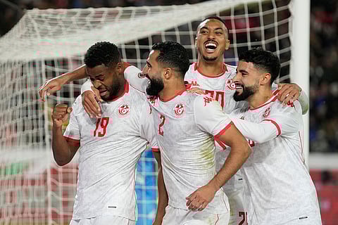 Tunisia players celebrate after a goal during the Africa Cup of Nations best of 16 soccer match between Mali and Tunisia in Casablanca, Morocco.