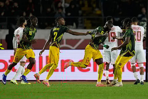 Mali players celebrate after a goal during the Africa Cup of Nations best of 16 soccer match between Mali and Tunisia in Casablanca, Morocco.