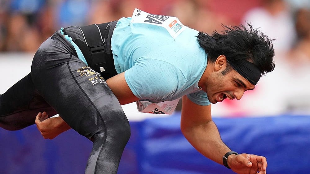 Neeraj Chopra in action. - | Photo: AP/Petr David Josek