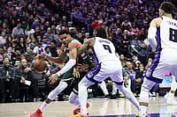 | Photo: AP/Sara Nevis : Milwaukee Bucks forward Giannis Antetokounmpo, left, drives to the basket with Sacramento Kings forward Precious Achiuwa (9) defending during the first half of an NBA basketball game in Sacramento, California. 