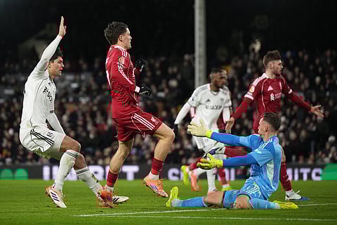Liverpool's Florian Wirtz scores his side's first goal, allowed after a VAR check, during the English Premier League soccer match between Fulham and Liverpool in London.