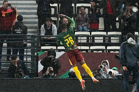 Cameroon's Christian Kofane celebrates after scoring his team's second goal during the Africa Cup of Nations round of 16 soccer match between South Africa and Cameroon in Rabat, Morocco.