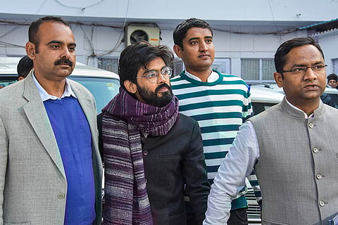 Supreme Court refused to grant bail to activists Sharjeel Imam and Umar Khalid, unseen in the picture, in the 2020 Delhi riots conspiracy matter, saying there was a prima facie case against them under the Unlawful Activities (Prevention) Act. Sharjeel Imam is being taken to court, at Chanakyapuri in New Delhi, in this file image dated Jan. 29, 2020. 