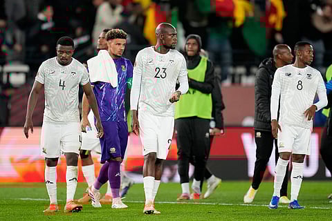 South Africa's players leave the pitch after losing the Africa Cup of Nations round of 16 soccer match between South Africa and Cameroon in Rabat, Morocco.