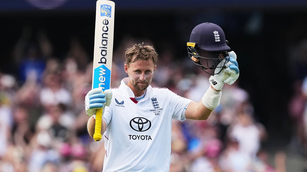 England's Joe Root celebrates after scoring a century during play on day two of the fifth and final Ashes cricket test between England and Australia in Sydney, Monday, Jan. 5, 2026.  - | Photo: AP/Mark Baker