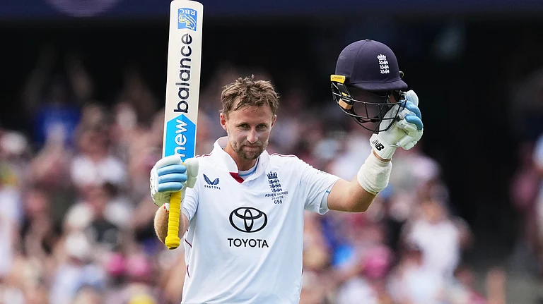 England's Joe Root celebrates after scoring a century during play on day two of the fifth and final Ashes cricket test between England and Australia in Sydney, Monday, Jan. 5, 2026. - | Photo: AP/Mark Baker