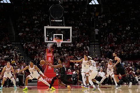 Play continues with the shot clock not working during the first half of an NBA basketball game between the Phoenix Suns and Houston Rockets in Houston.