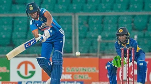 | Photo: PTI : India's captain Harmanpreet Kaur plays a shot during the fifth T20 International cricket match of a series between India Women and Sri Lanka Women, at Greenfield International Stadium, in Thiruvananthapuram, Kerala.