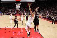 | Photo: AP/David J. Phillip : Phoenix Suns' Devin Booker (1) goes up for a shot as Houston Rockets' Steven Adams (12) defends during the second half of an NBA basketball game in Houston. 
