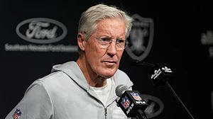 AP : Ousted Las Vegas Raiders head coach Pete Carroll speaks during a news conference following an NFL football game against the Kansas City Chiefs.