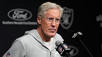 AP : Ousted Las Vegas Raiders head coach Pete Carroll speaks during a news conference following an NFL football game against the Kansas City Chiefs.