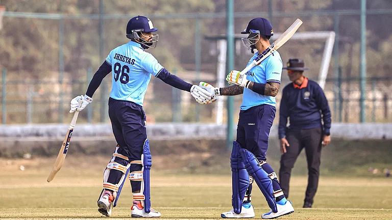 Mumbai's captain Shreyas Iyer being greeted by teammate Suryakumar Yadav after the former's half century during the Vijay Hazare Trophy 2025-26 cricket match between Mumbai and Himachal Pradesh, at Jaipuria Vidyalaya Ground, in Jaipur, - (PTI/VISHAL BHATNAGAR)