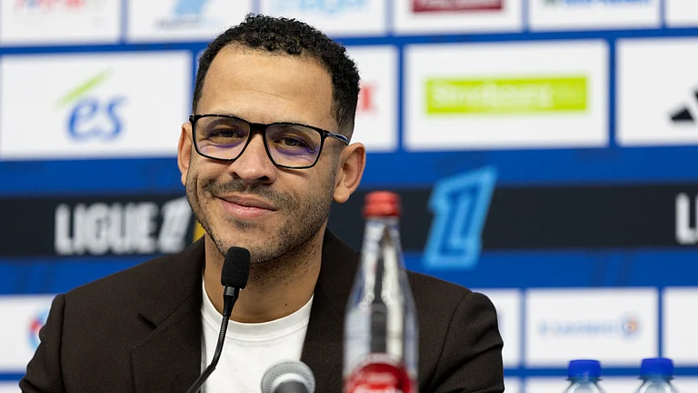 Liam Rosenior announced he was leaving Strasbourg at a press conference earlier on Tuesday - null