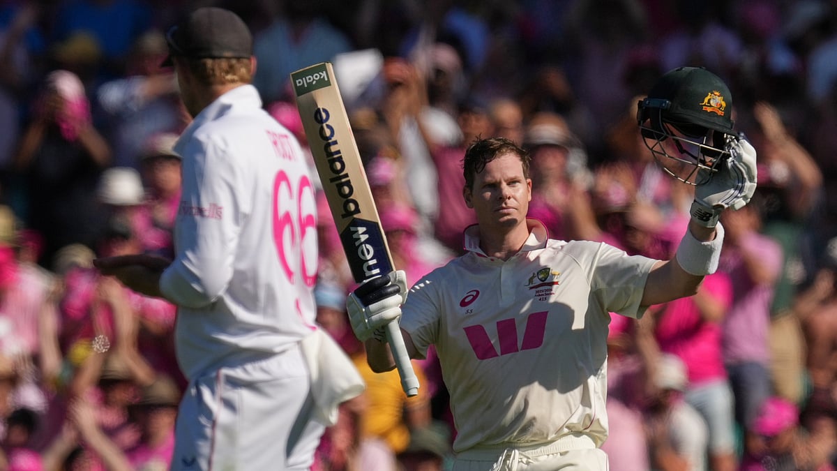 Steve Smith raises his bat after reaching his hundred in the 5th Ashes Test. - AP/Mark Baker