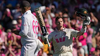 AP/Mark Baker : Steve Smith raises his bat after reaching his hundred in the 5th Ashes Test.