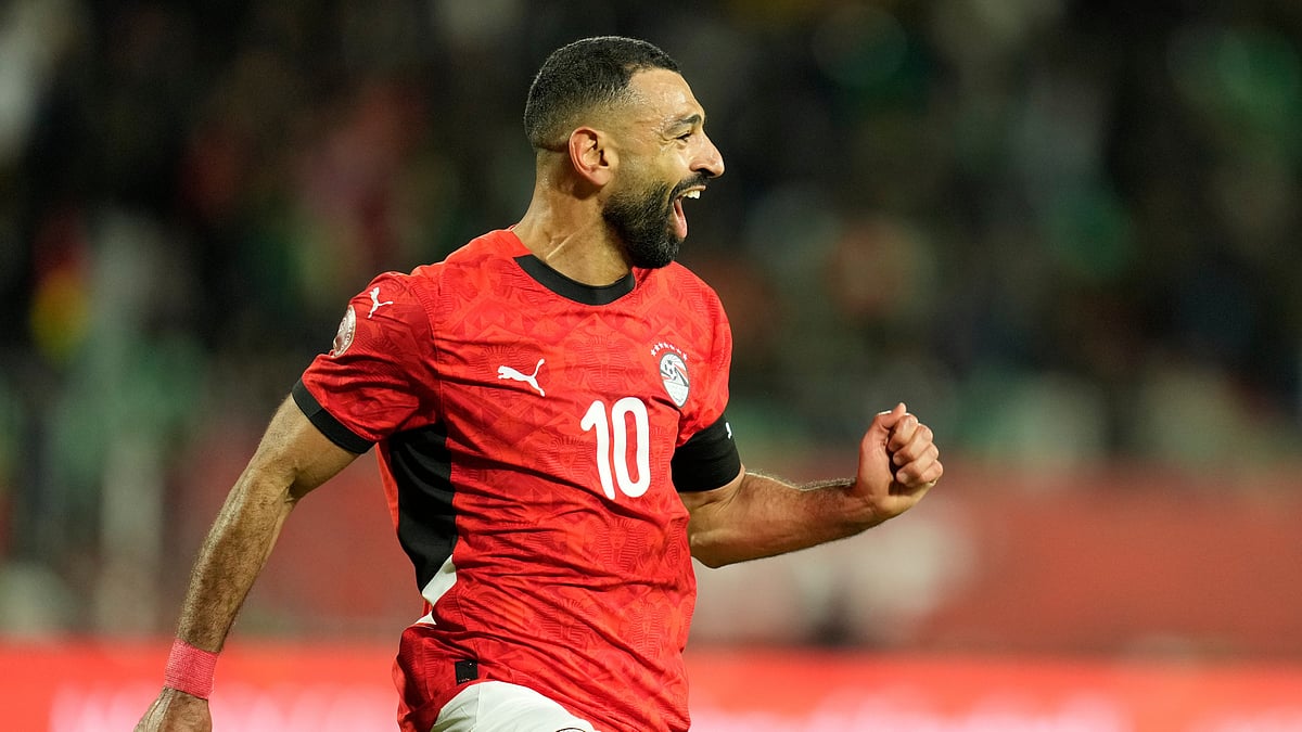 Egypt's Mohamed Salah celebrates after scoring his side's third goal during the Africa Cup of Nations round of 16 soccer match between Egypt and Benin in Agadir, Morocco, Monday, Jan. 5, 2026.  - (AP Photo/Mosa'ab Elshamy)