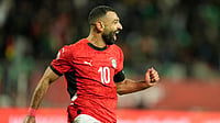 (AP Photo/Mosa'ab Elshamy) : Egypt's Mohamed Salah celebrates after scoring his side's third goal during the Africa Cup of Nations round of 16 soccer match between Egypt and Benin in Agadir, Morocco, Monday, Jan. 5, 2026. 
