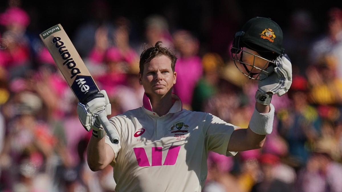 (AP Photo/Mark Baker) : Australia's Steve Smith celebrates after scoring a century during play on day three of the fifth and final Ashes cricket test between England and Australia in Sydney, Tuesday, Jan. 6, 2026. 
