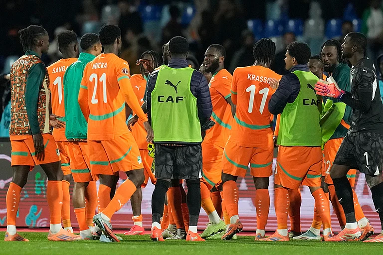 Ivory Coast's players celebrate after the Africa Cup of Nations best of 16 soccer match between Ivory Coast and Burkina Faso in Marrakech, Morocco. - | Photo: AP/Themba Hadebe